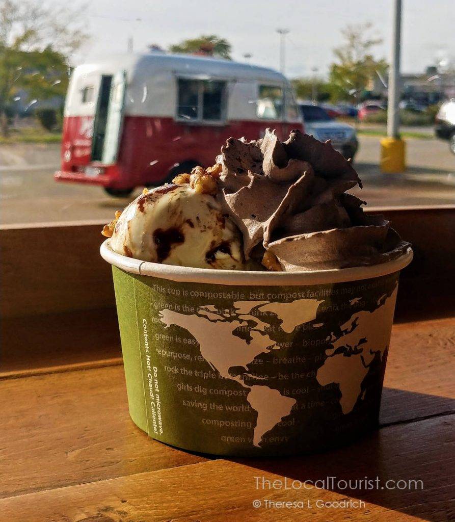 Sundae at Julie Ann's Frozen Custard with their signature ice cream truck in the background