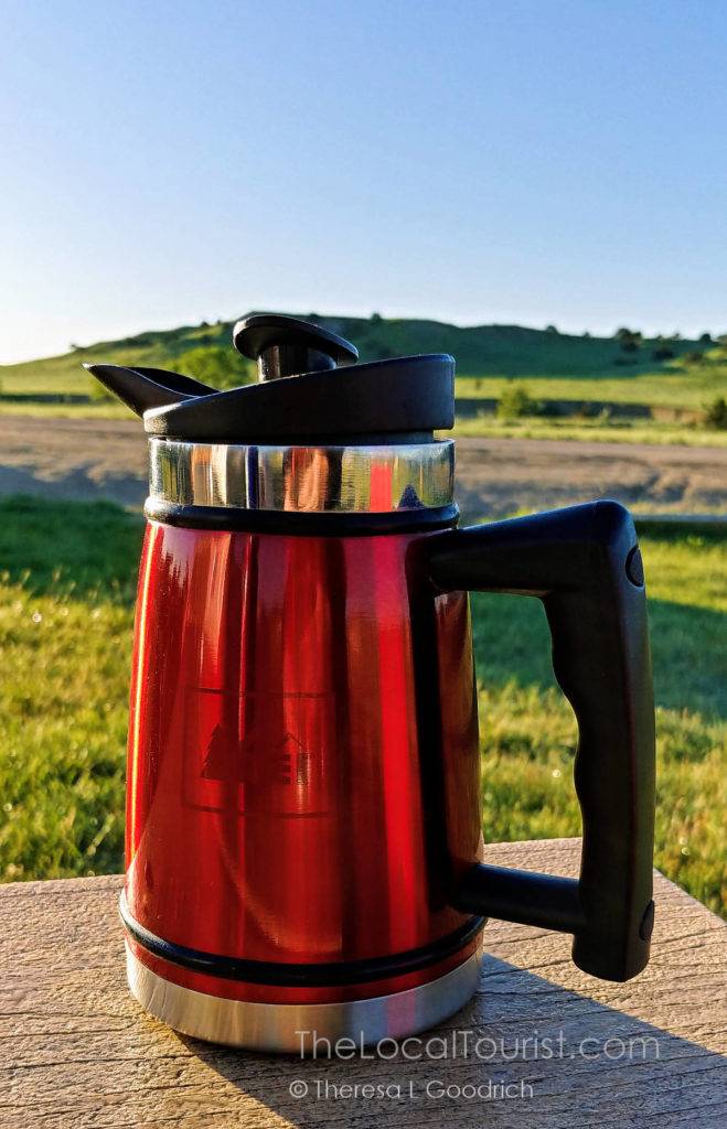 Skip the coffee shop and bring your own French press to save money on a road trip