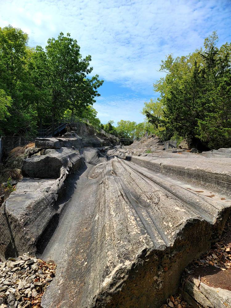 Glacial Grooves State Memorial. This National Natural Landmark protects the largest easily accessible grooves in the world. To see them is to witness the power of the glaciers that shaped North America.