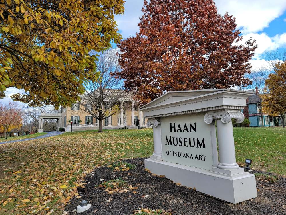 Museum sign with autumn foliage