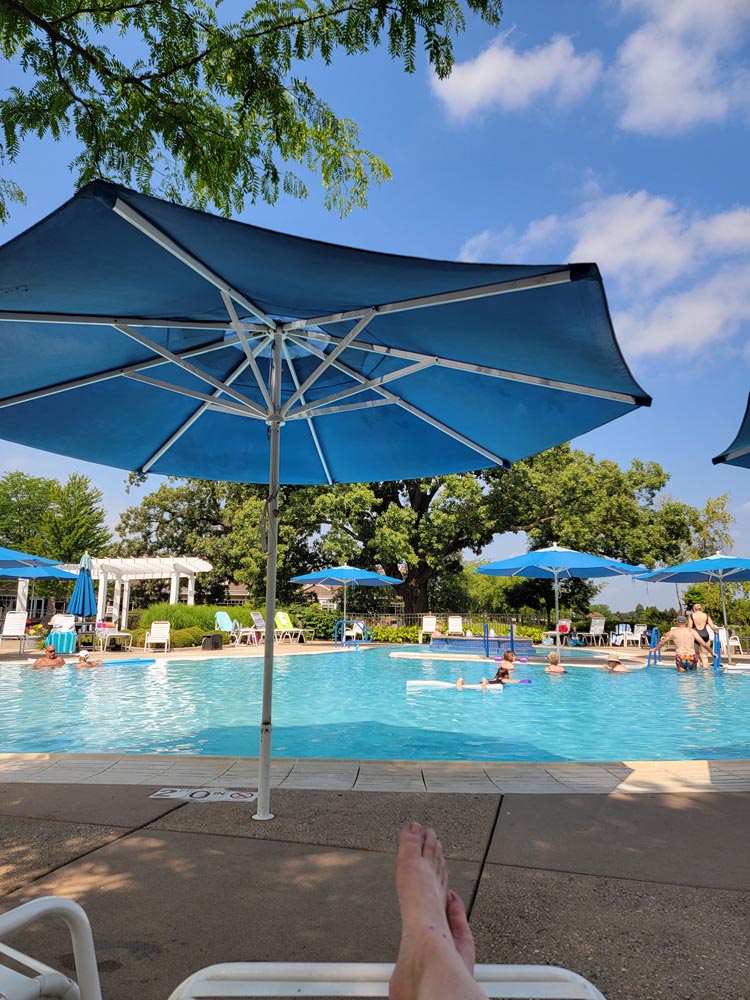 View of pool and umbrella