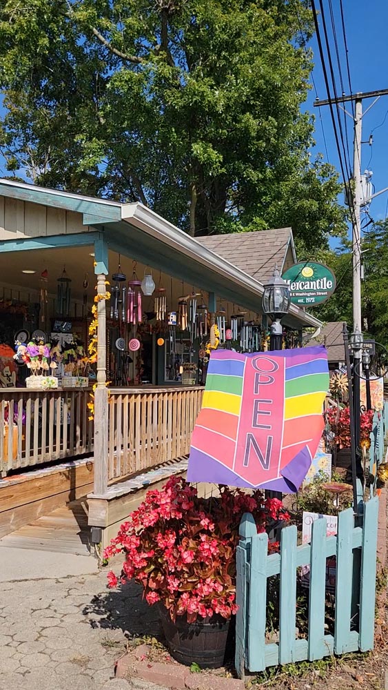 Store in Brown County, Indiana with wind chimes and flying rainbow flag