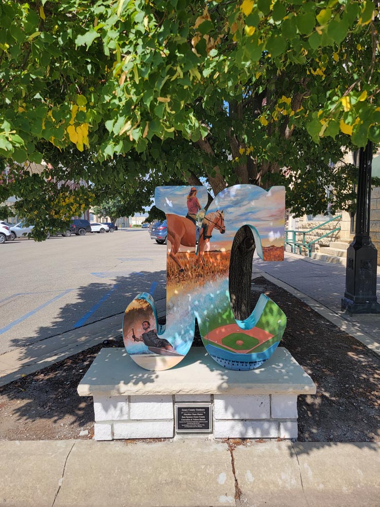 JC Statue under a tree